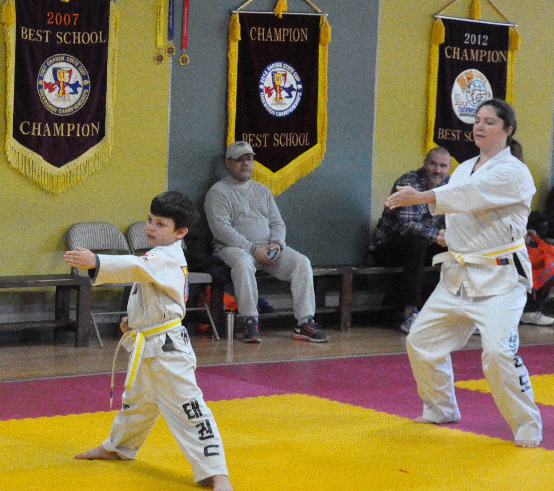 Family self-defense training at Ahn's Taekwondo