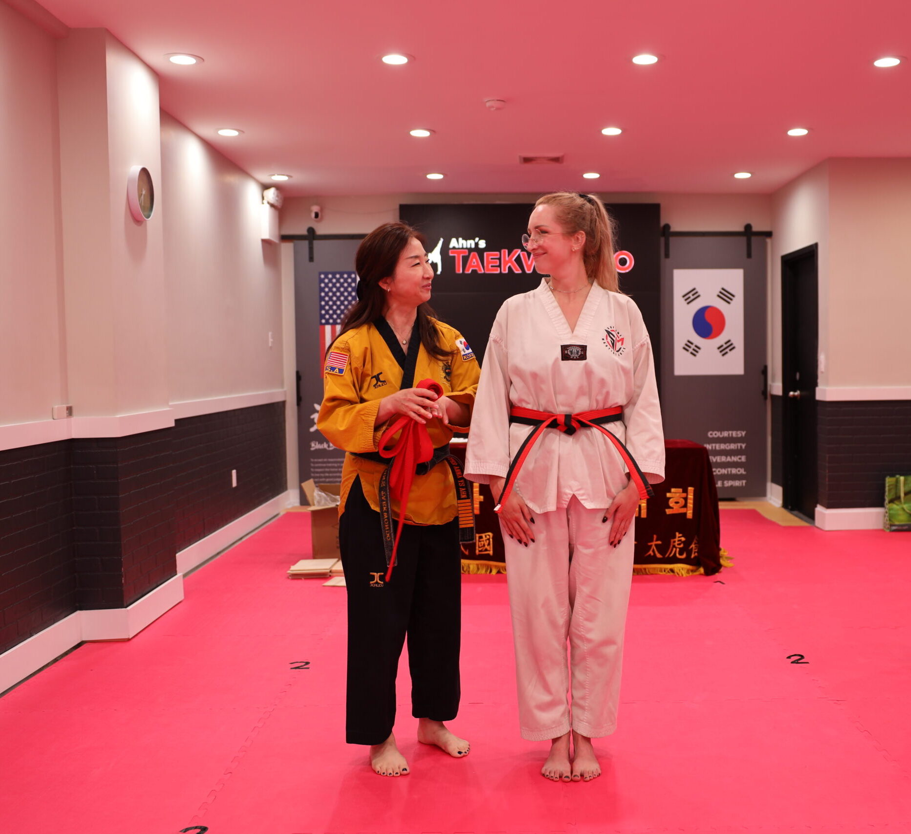 Adult student training with instructor at Ahn's Taekwondo NYC