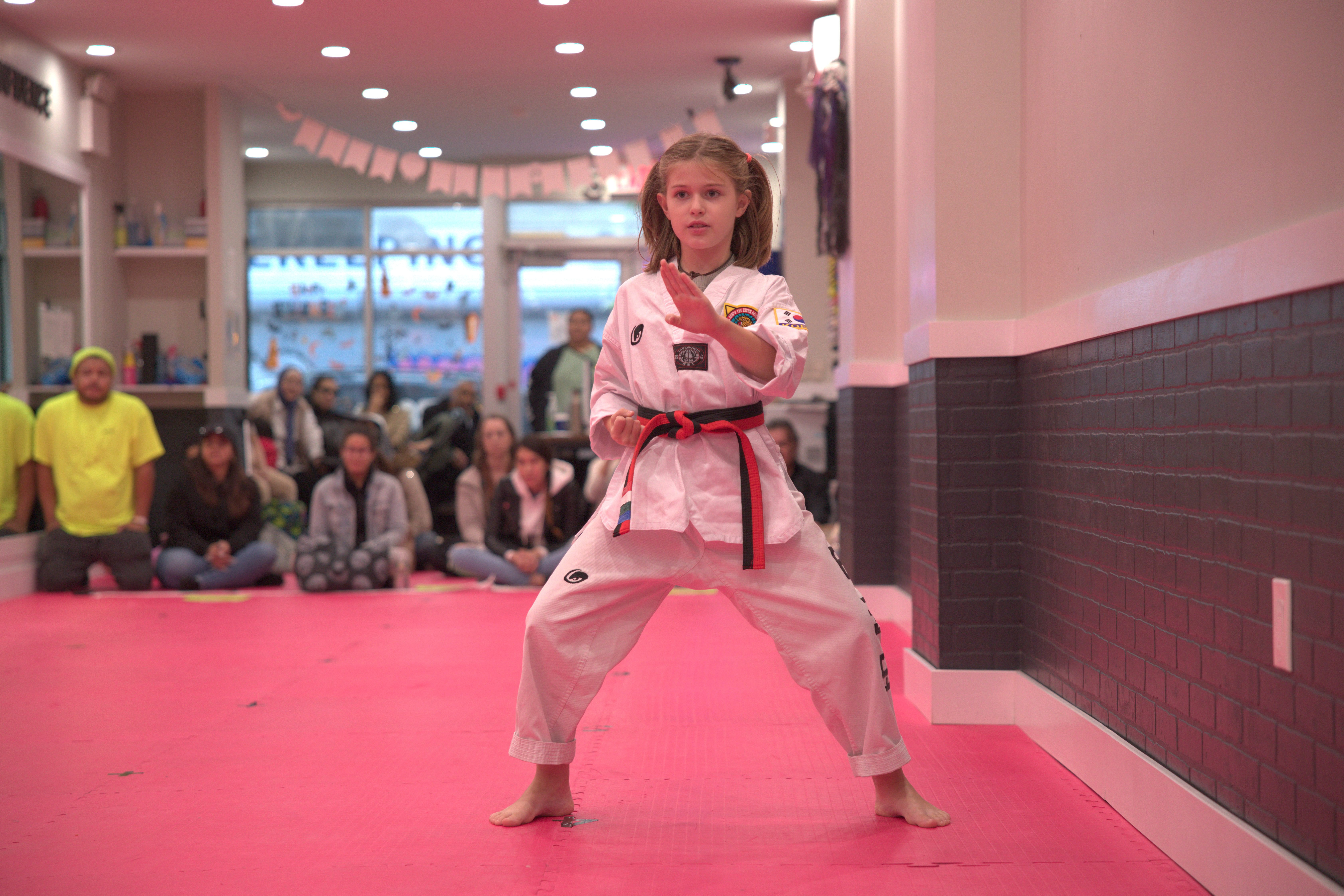 Young student in fighting stance at Ahn's Taekwondo NYC