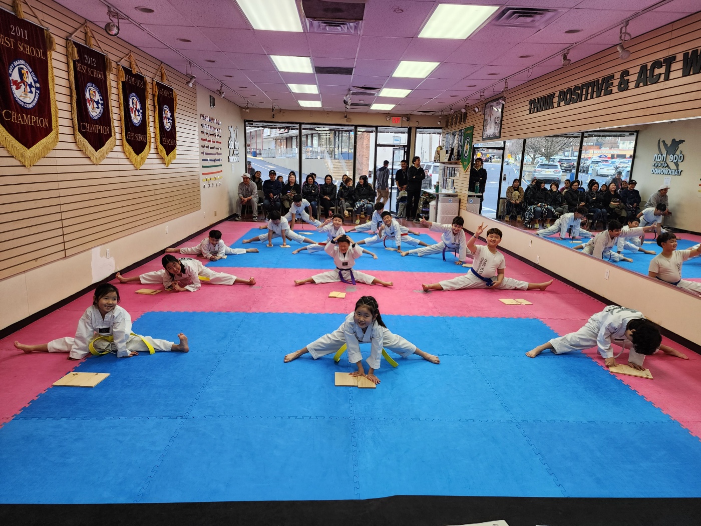Students stretching during Taekwondo class