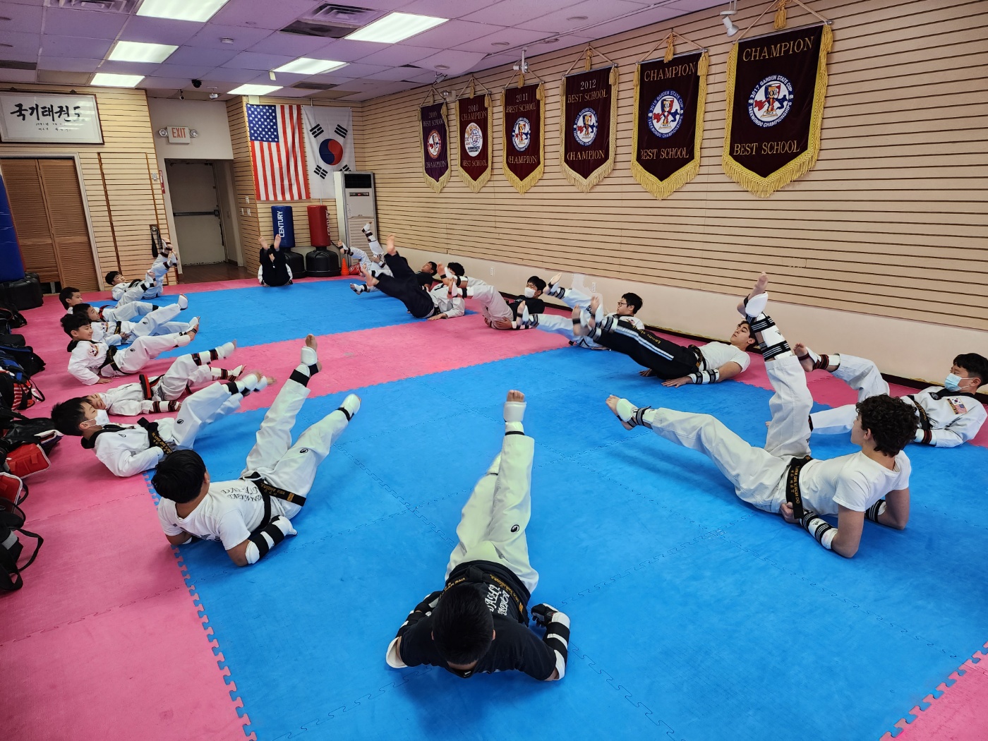 Students stretching before Taekwondo class