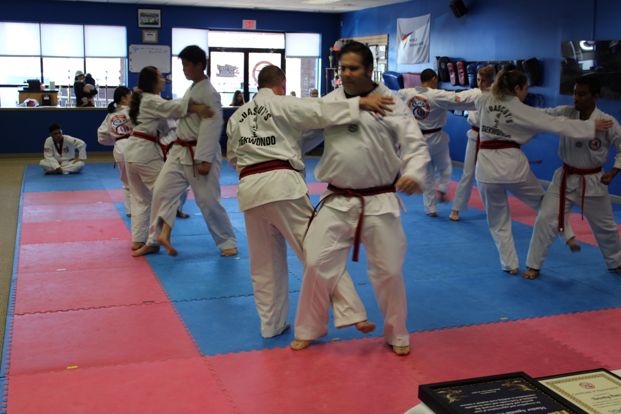 Adult students practicing partner drills at Cuascut’s Academy