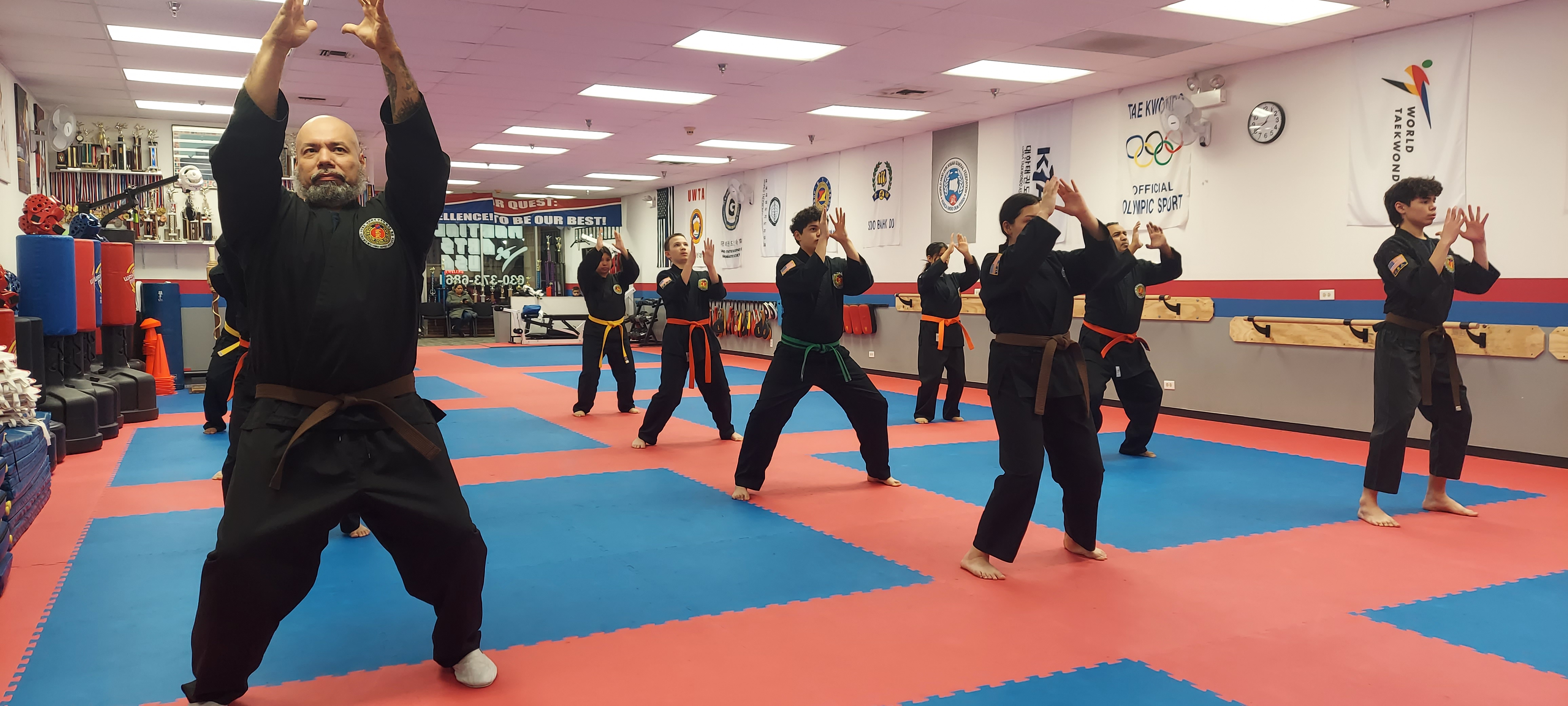Hapkido students training in black uniforms in Wood Dale