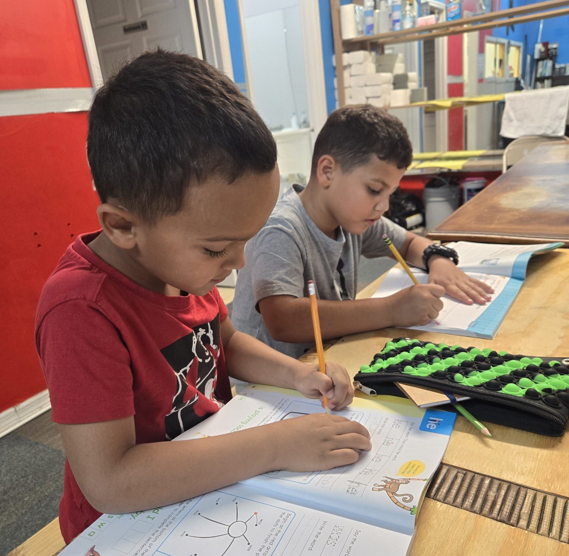 After school students doing homework at Joung's Taekwondo