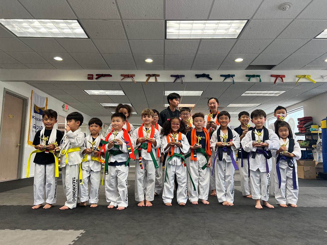 Children earning achievements at One Taekwondo