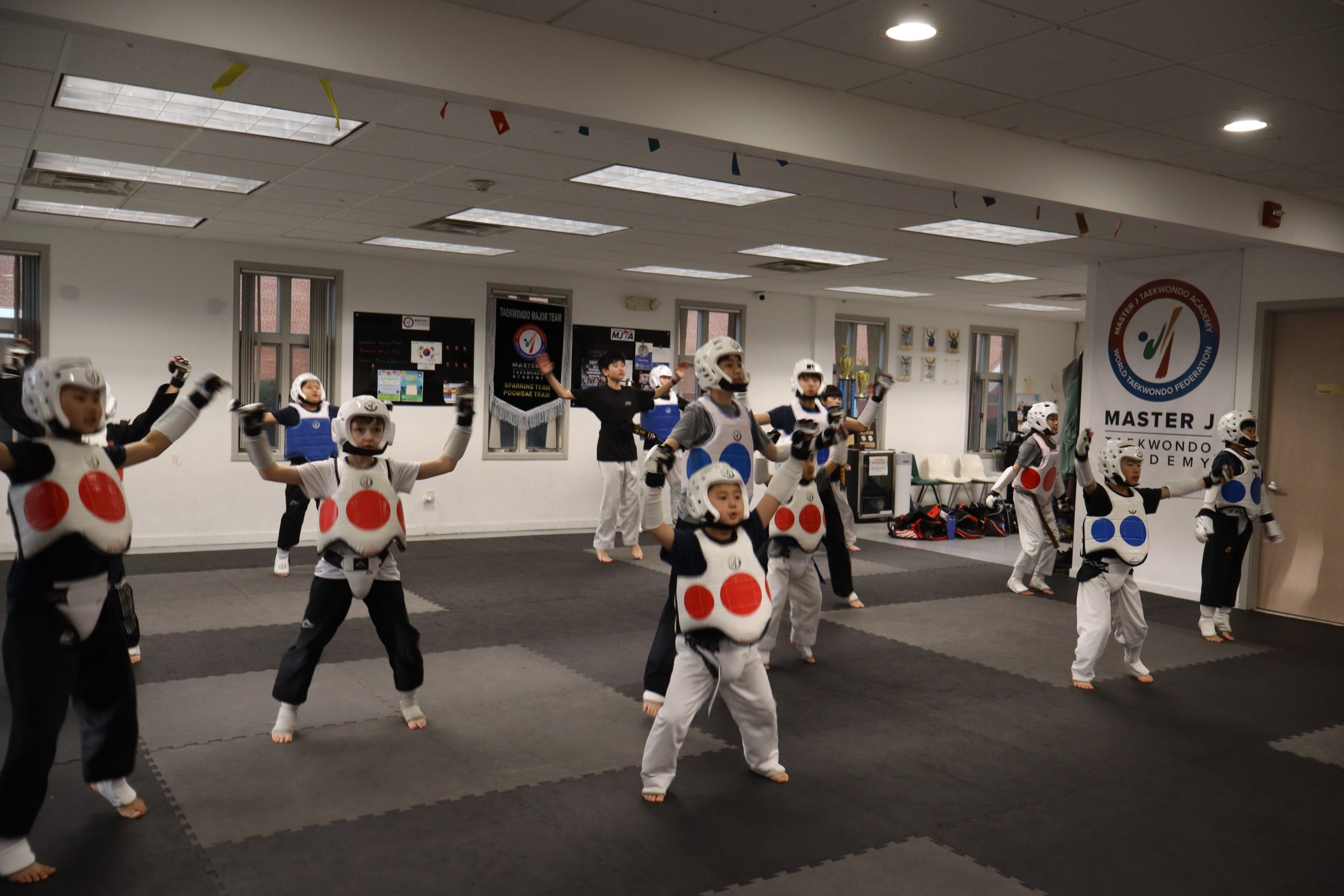 Sparring team training with protective gear