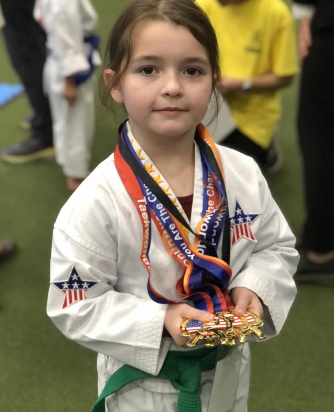 Little Tigers earning medals at Jeong's World Taekwondo Academy