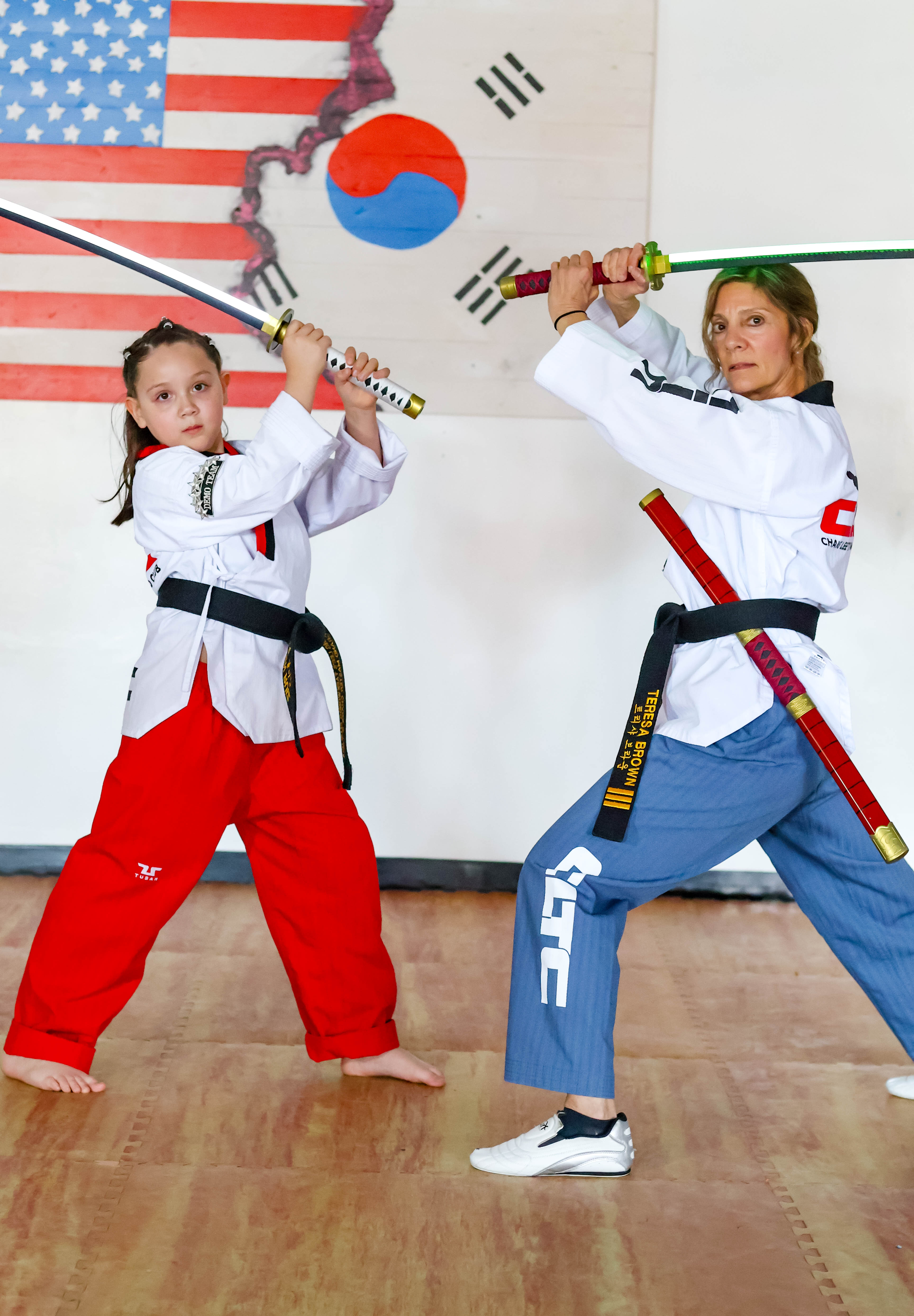 Teens and adults sparring at Chang Lee's Taekwondo in Batavia, IL
