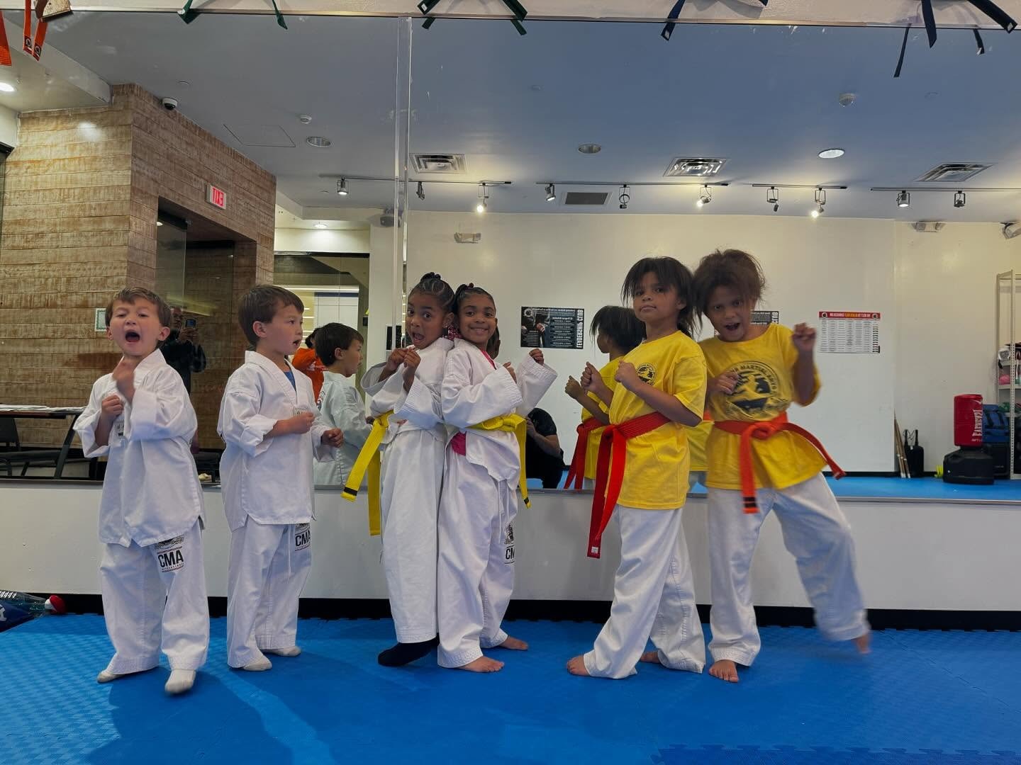 Young children building confidence through martial arts