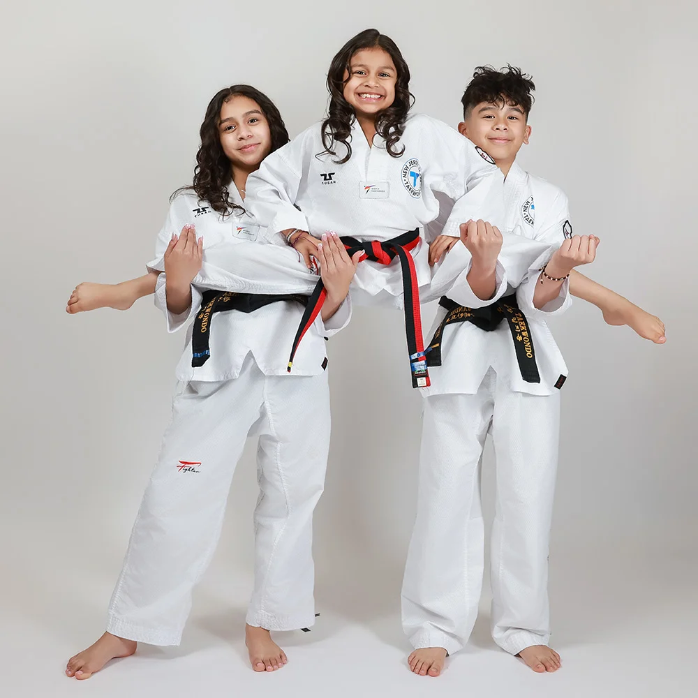 Student with new belt achievement