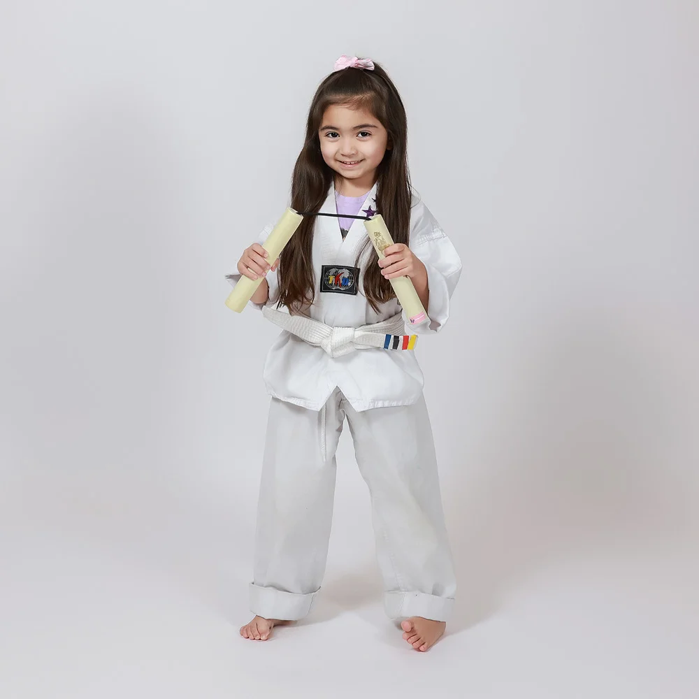 Taekwondo student kicking practice