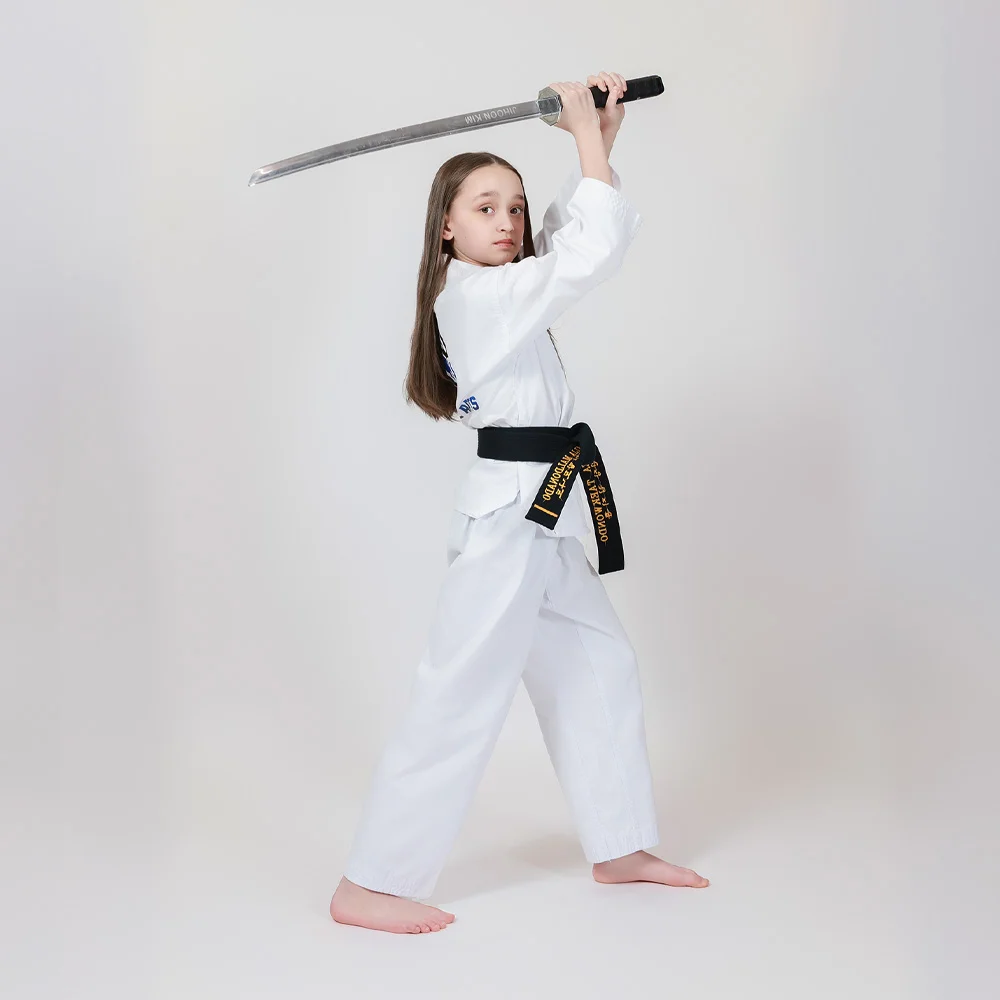Student practicing taekwondo form