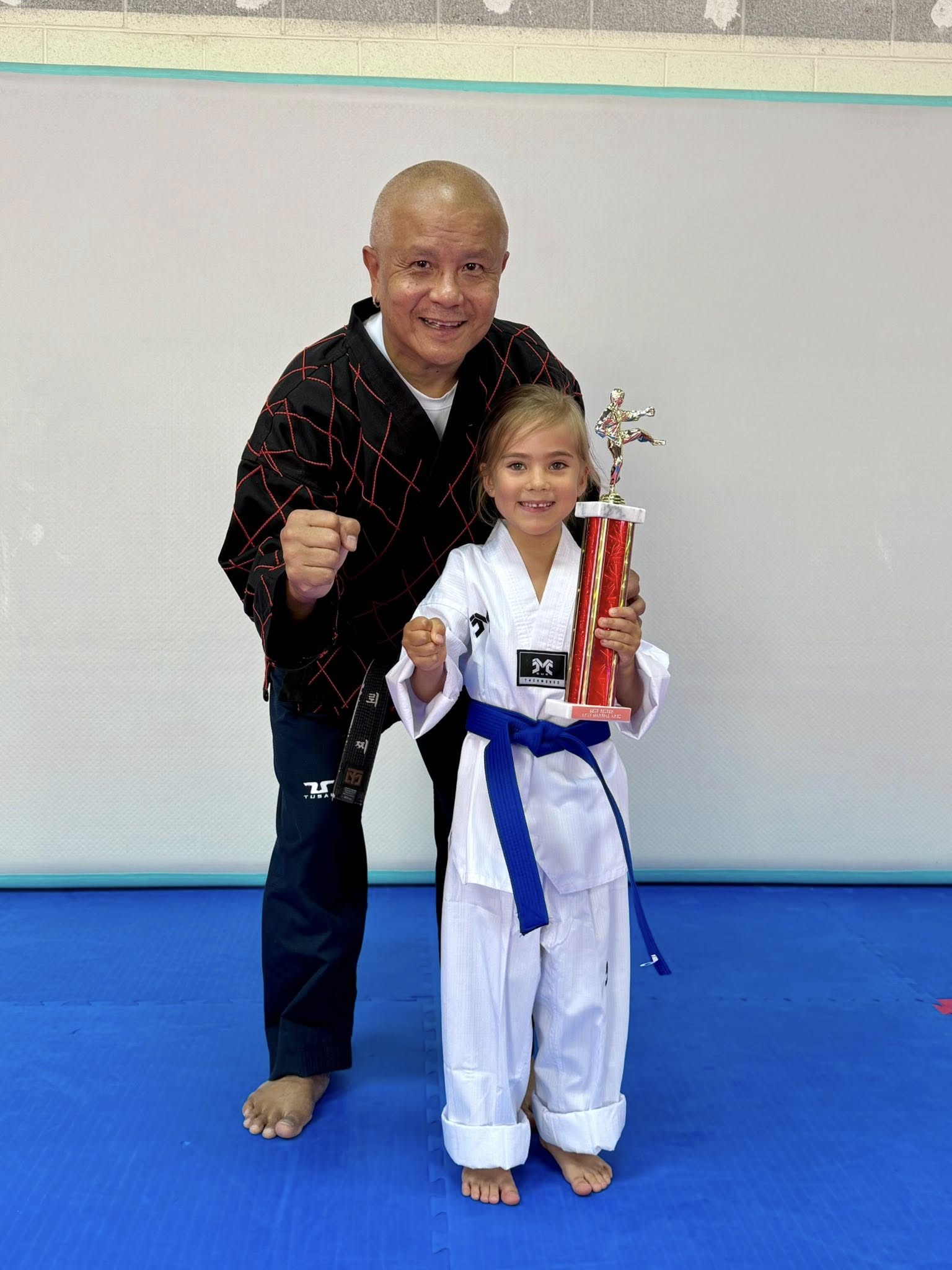 Young kids learning Taekwondo basics