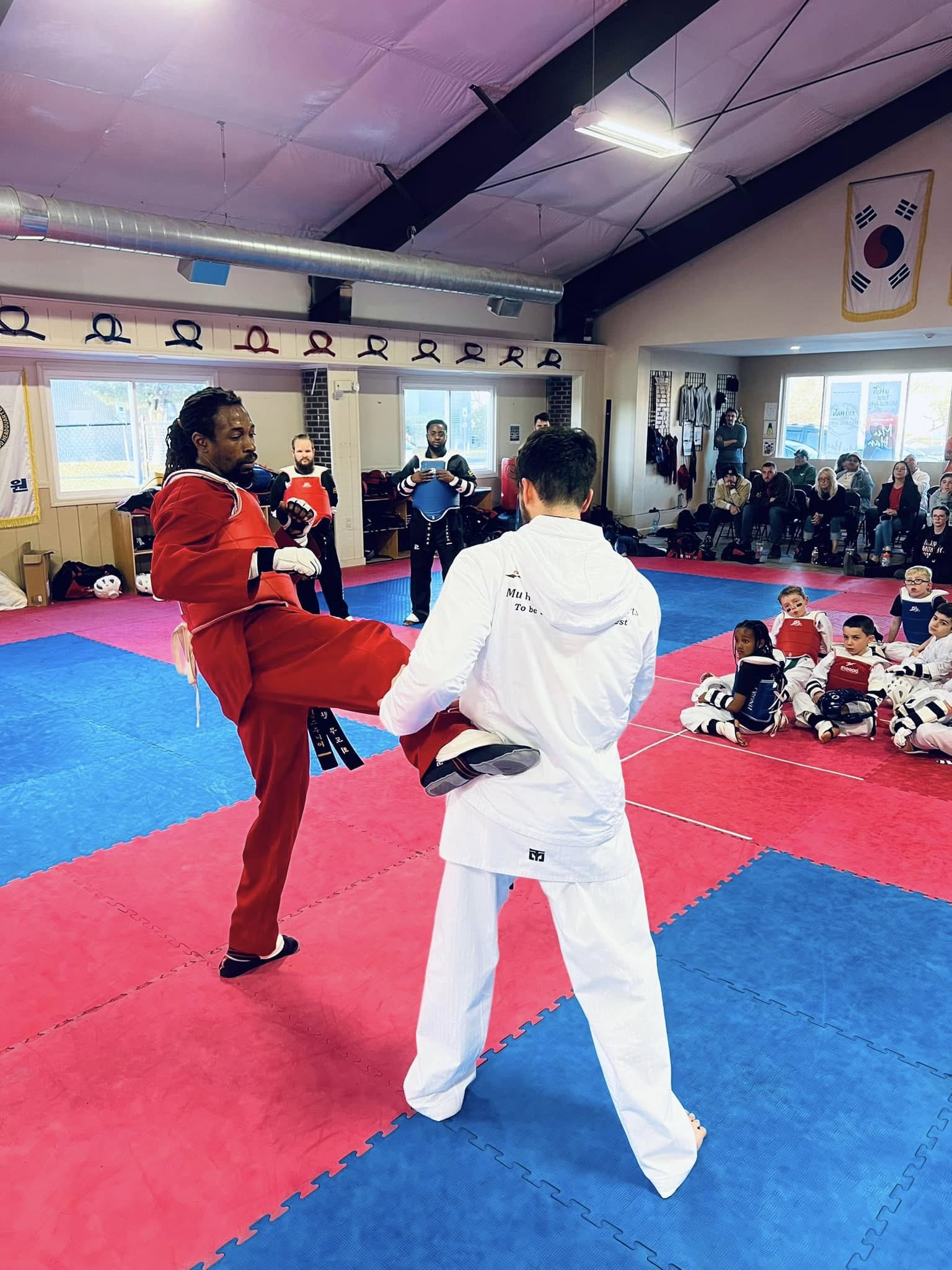 Adults achieving personal transformation through martial arts