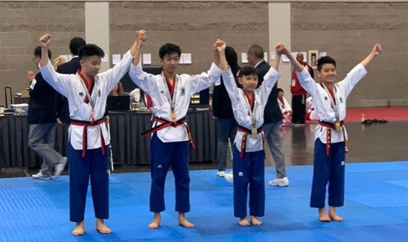 Taekwondo students and instructor