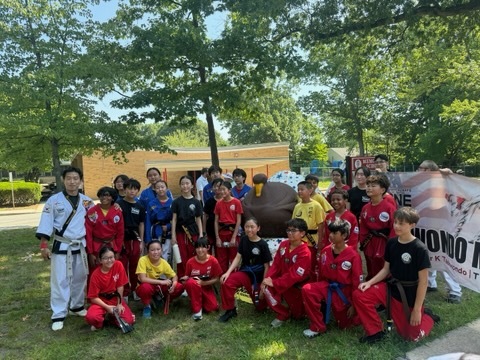 ONE TAEKWONDO MARTIAL ARTS students at a community event