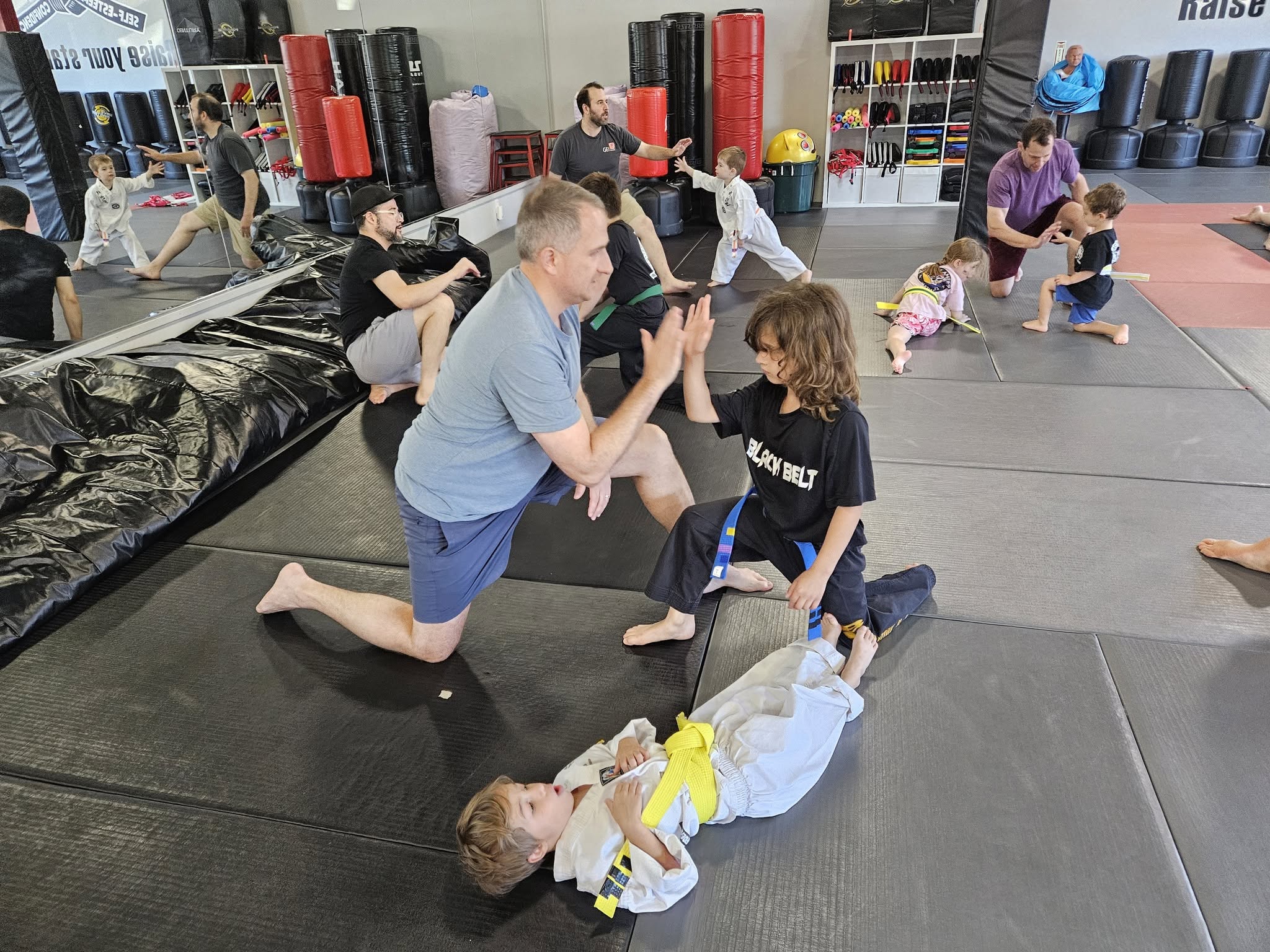 A family training in martial arts together