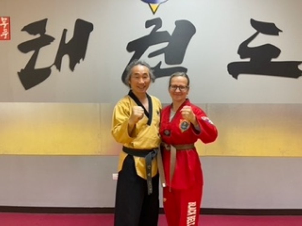 Grandmaster Jae Ro Ahn training alongside an instructor at the dojang