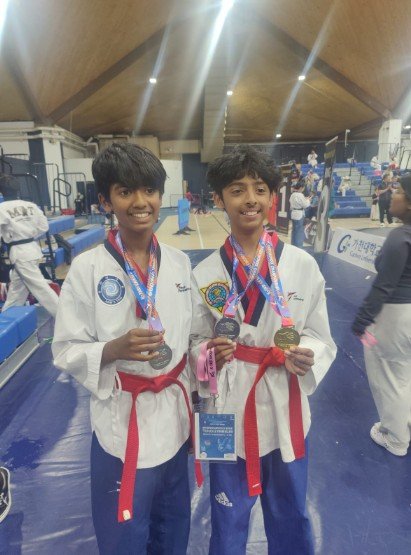 Ahn's Taekwondo students with their competition medals