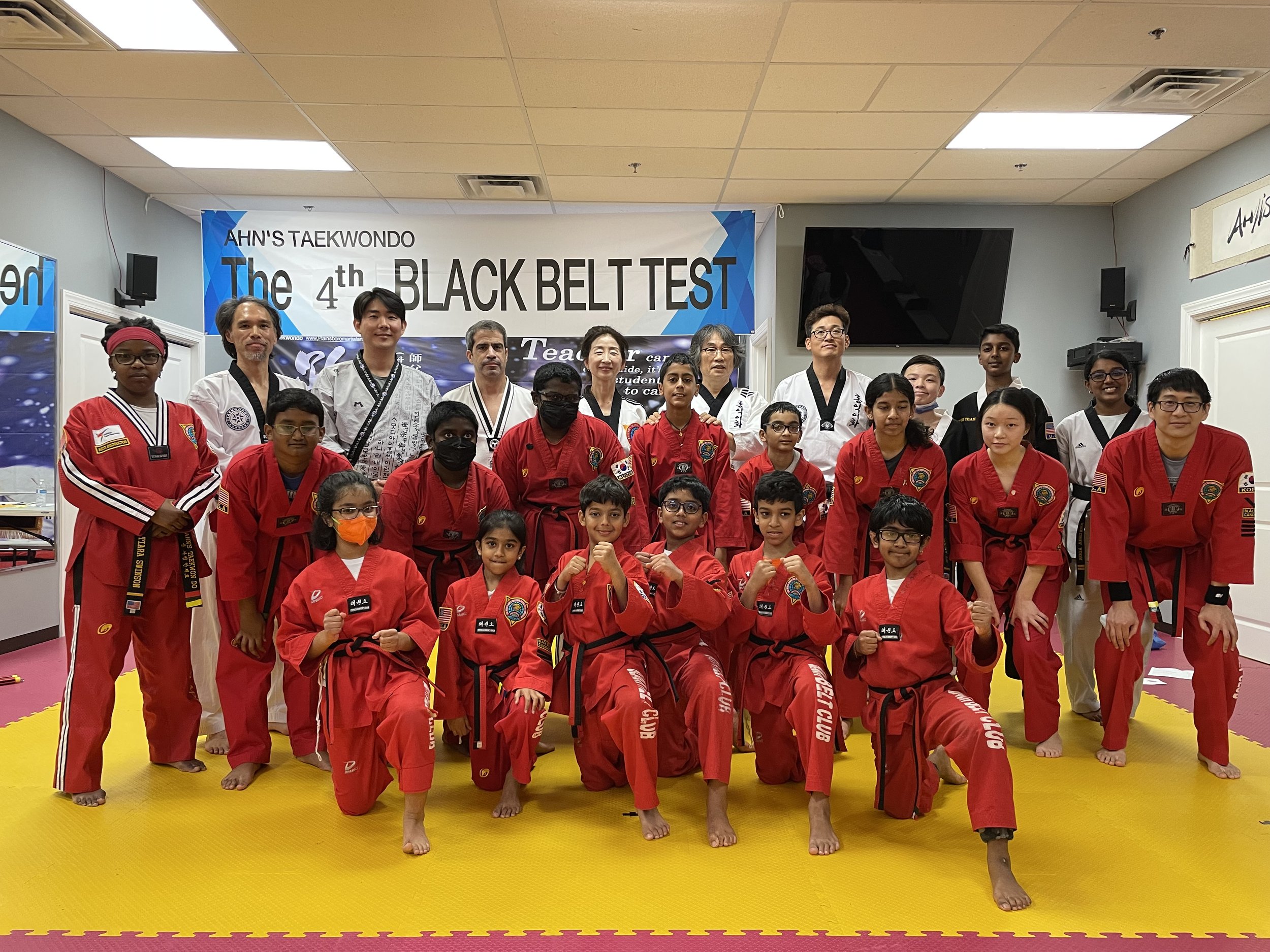 Black belt test group photo at Ahn's Taekwondo in Plainsboro