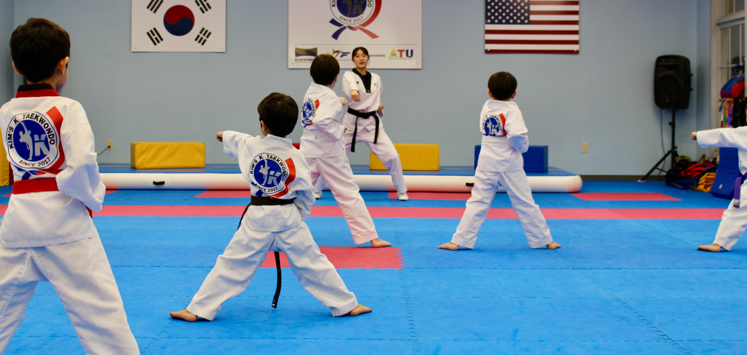 Young students practicing stances in class