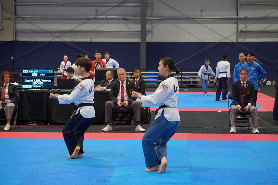 Pair poomsae in front of the judging panel