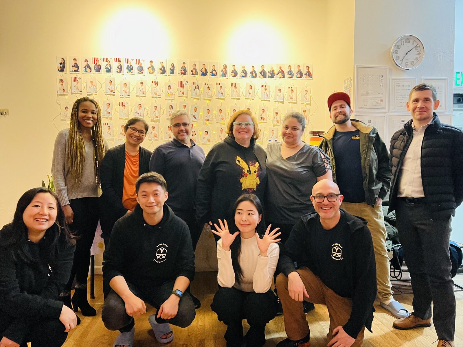 Adult members of Broadway TaeKwonDo together at a community event