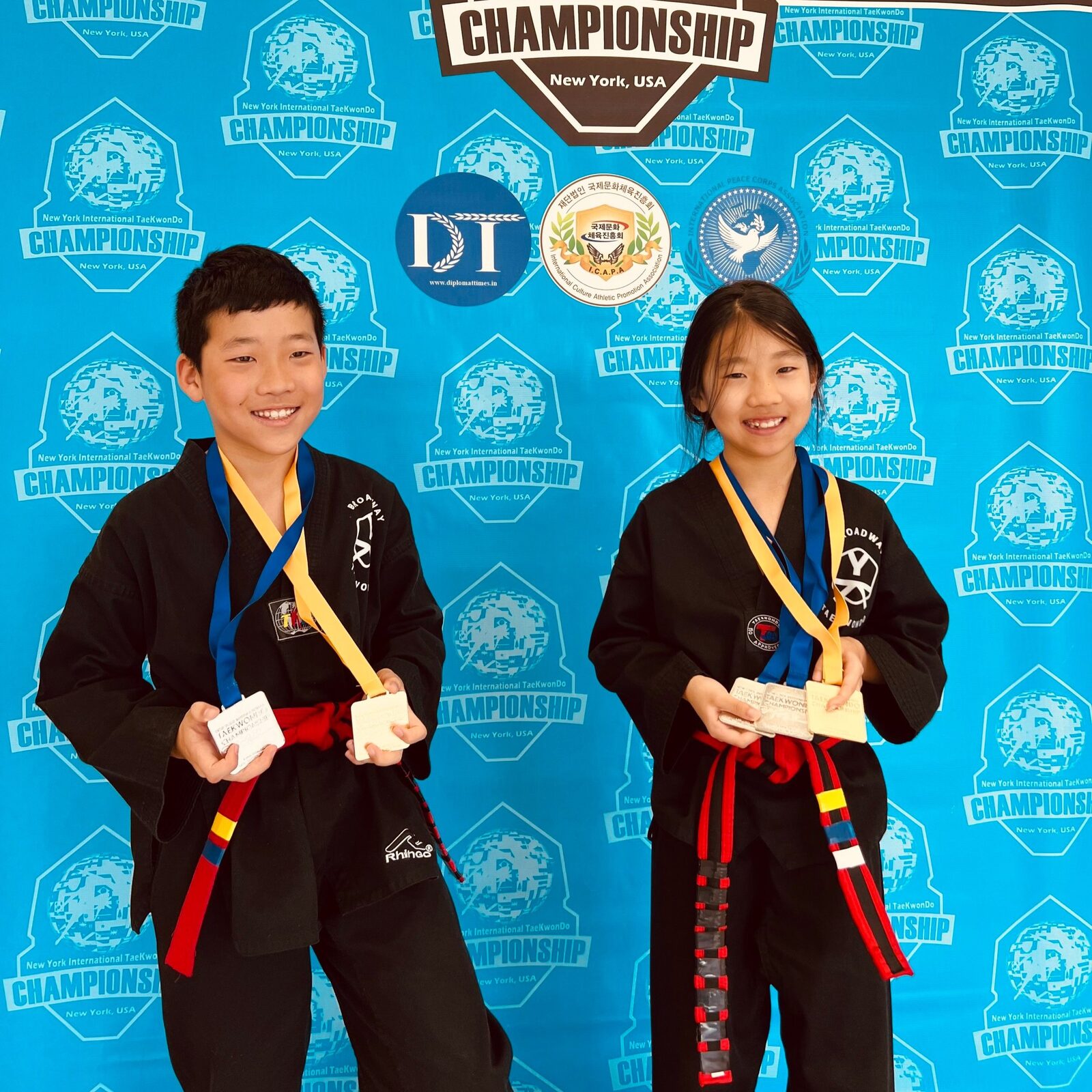 Students with their medals and trophies after a tournament